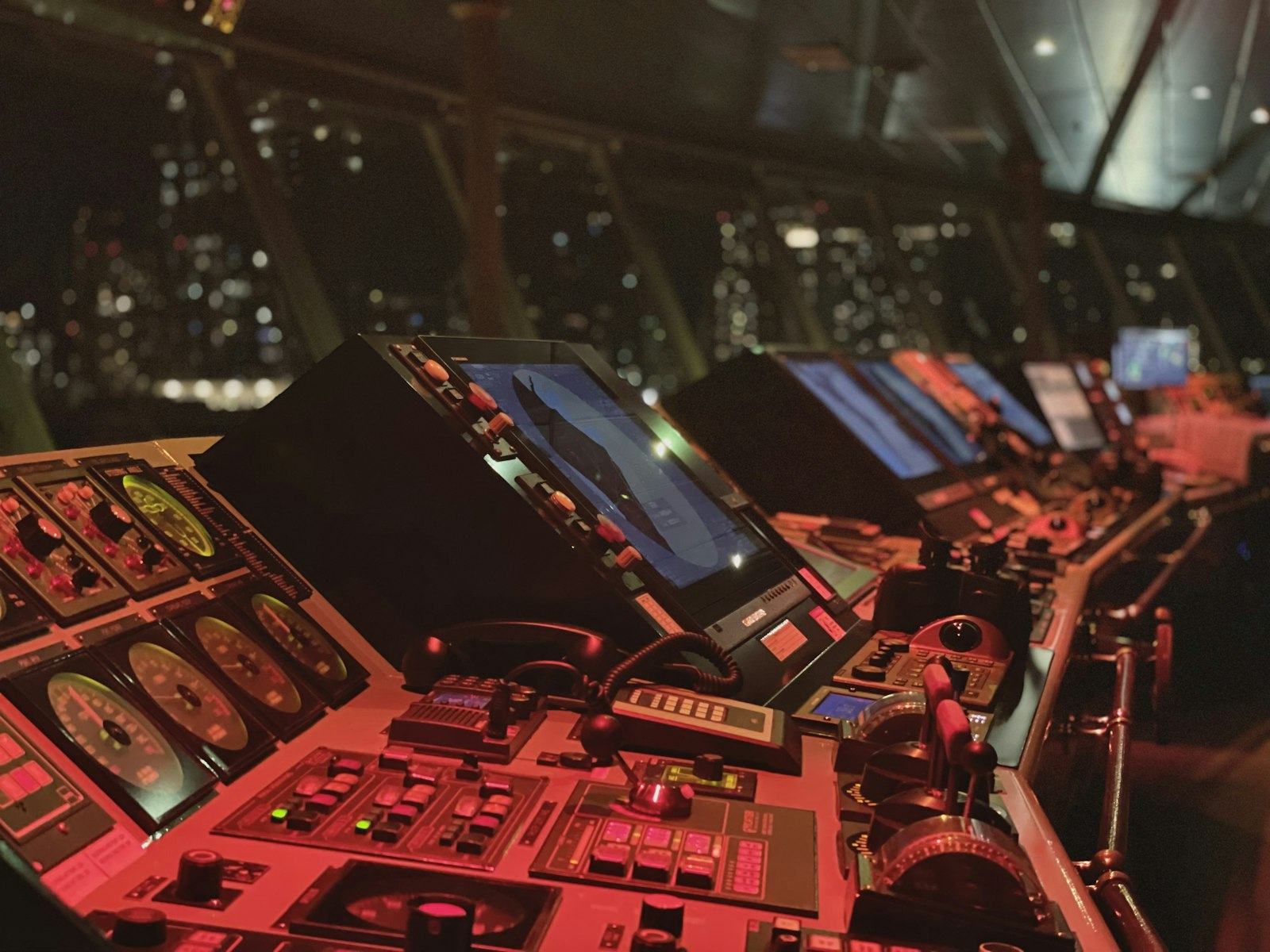 Ship bridge with navigation screens and control consoles